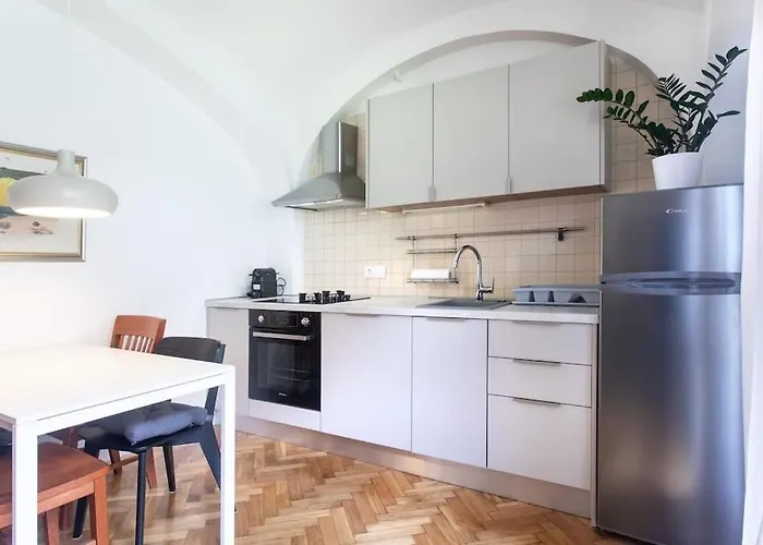 Green Oasis Apartment In The City With A Patio