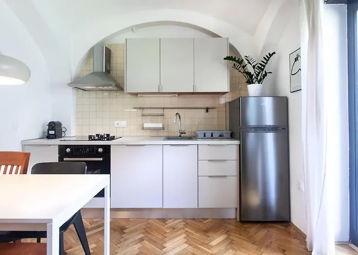 Green Oasis Apartment In The City With A Patio